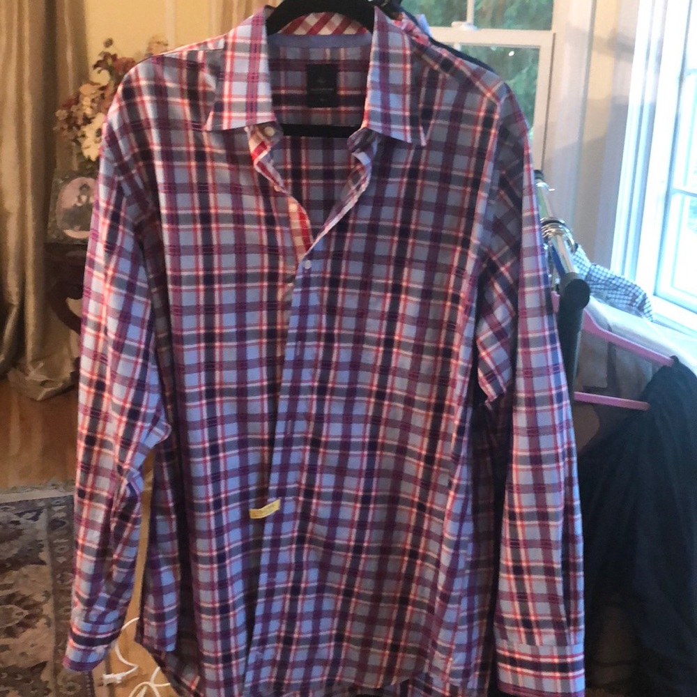 Button down men shirt folded cuffs